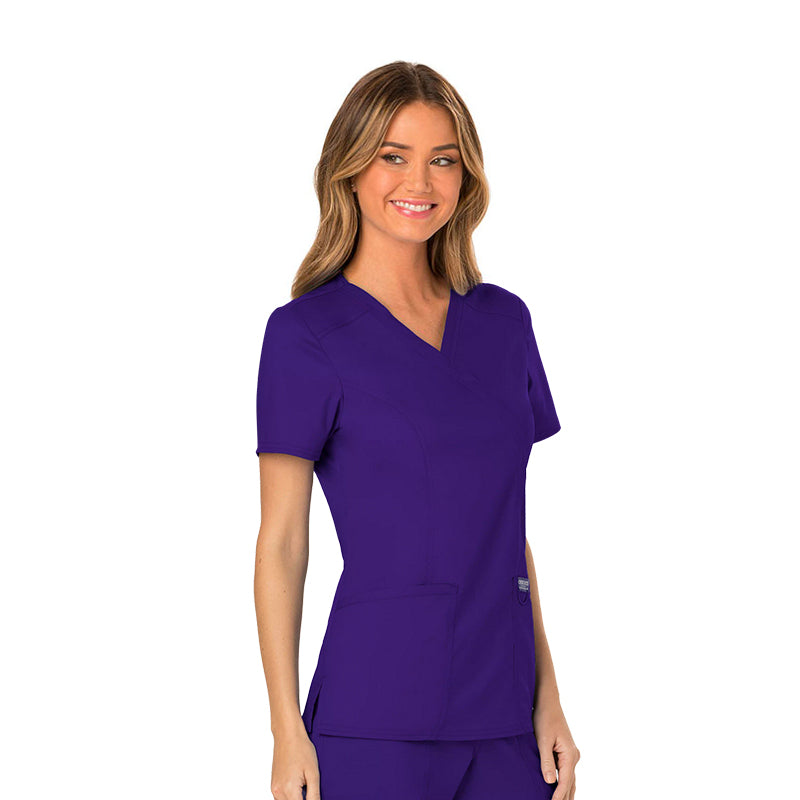 TOP MUJER REVOLUTION WW610 MORADO