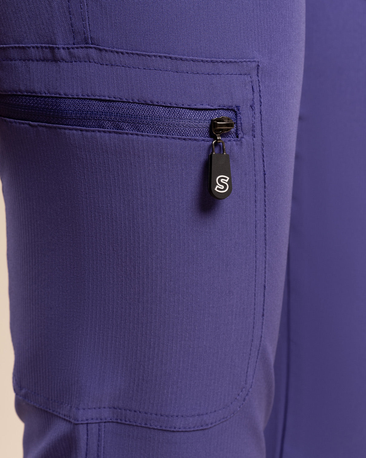 PANTALÓN MUJER WONDER MORADO